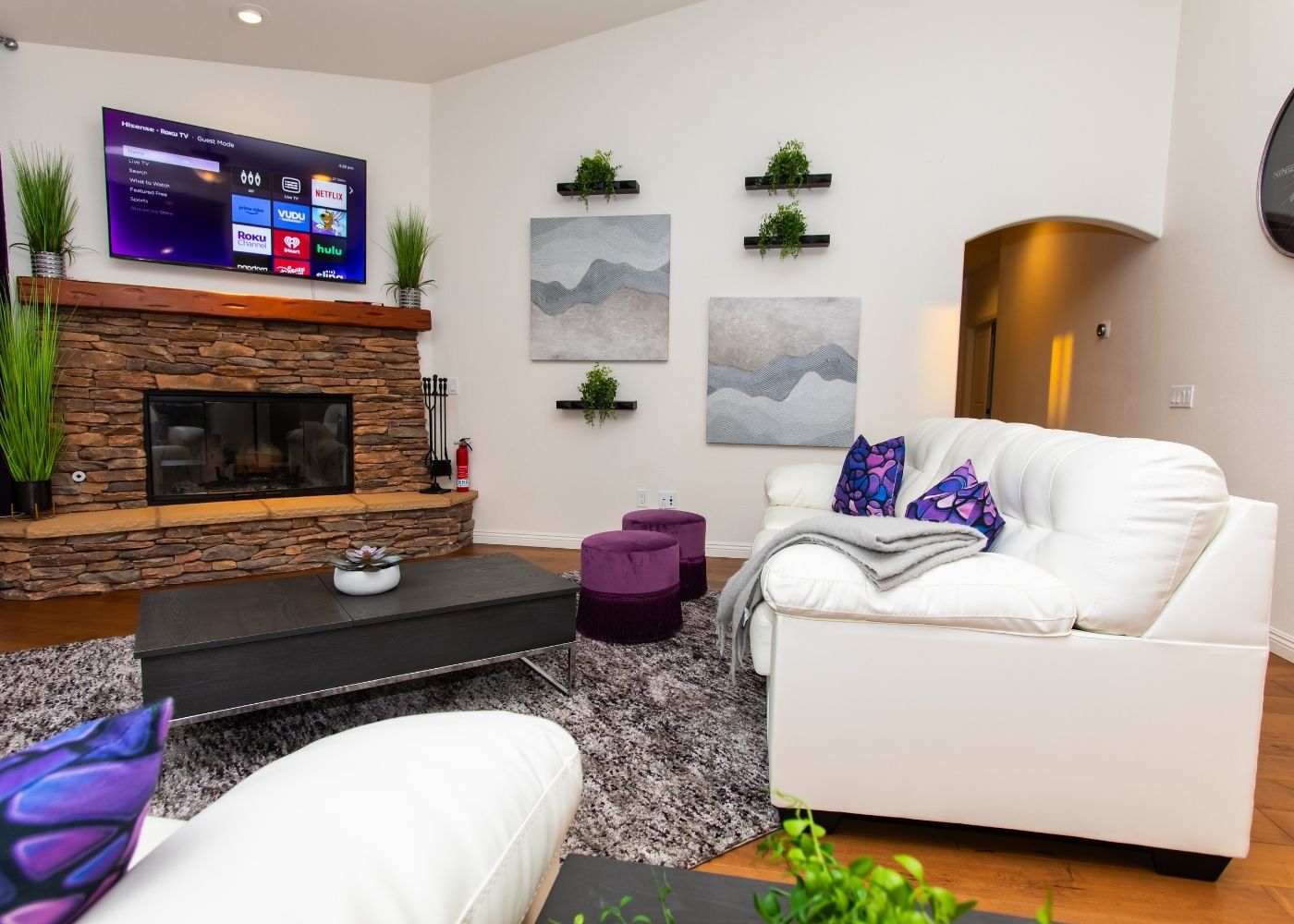 Private hot tub and cozy outdoor lounge at Hearth